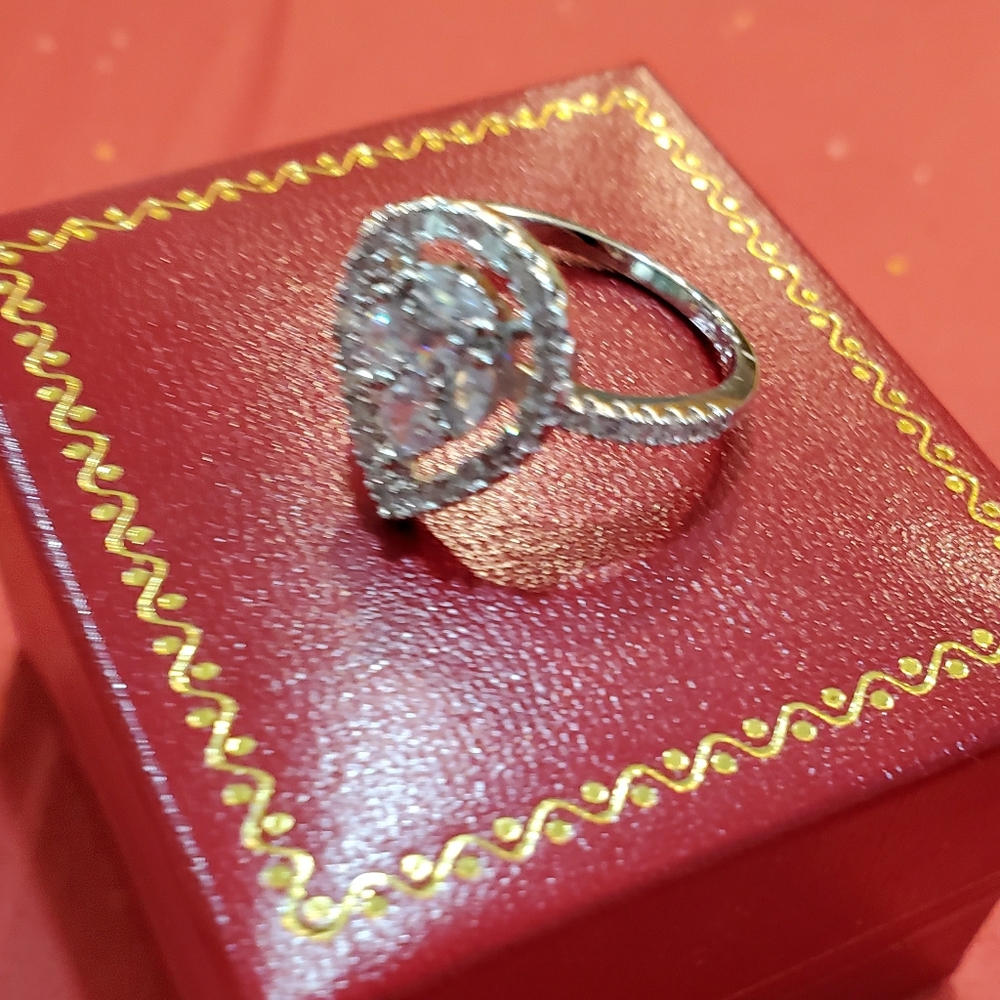Pear cut silver white sapphire size 7
